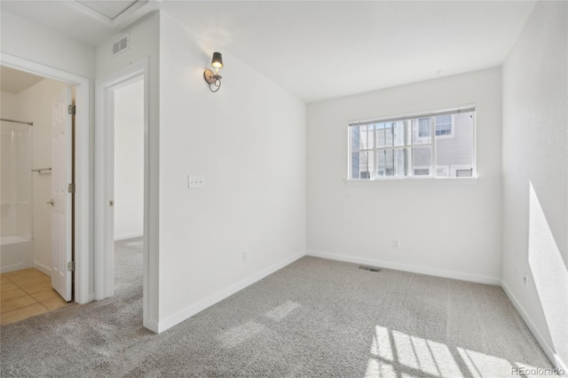 view of carpeted spare room