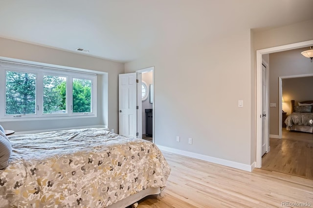 8505 E Temple Dr Unit 473, Denver, CO 80237 - bedroom with light wood-type flooring