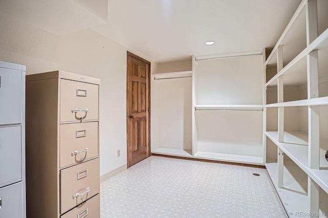 8505 E Temple Dr Unit 473, Denver, CO 80237 - spacious closet featuring tile patterned floors