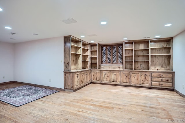 8505 E Temple Dr Unit 473, Denver, CO 80237 - wine room with light wood-style floors and recessed lighting