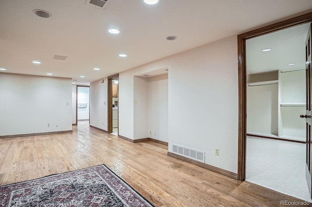 8505 E Temple Dr Unit 473, Denver, CO 80237 - empty room with light wood finished floors and recessed lighting