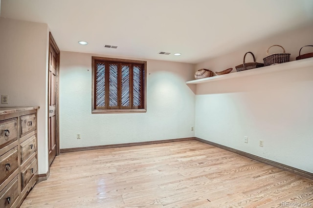 8505 E Temple Dr Unit 473, Denver, CO 80237 - spare room featuring light wood-type flooring and recessed lighting