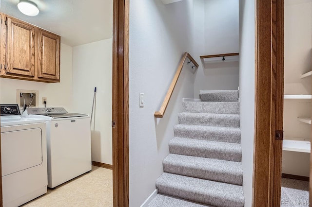 8505 E Temple Dr Unit 473, Denver, CO 80237 - laundry room featuring cabinet space and washing machine and clothes dryer