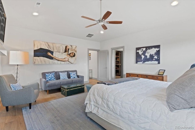 2533 N Emerson St, Denver, CO 80205 - bedroom featuring wood finished floors, recessed lighting, a spacious closet, a ceiling fan, and baseboards