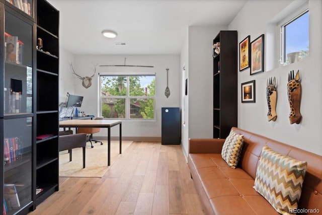 2533 N Emerson St, Denver, CO 80205 - home office with wood finished floors and baseboards