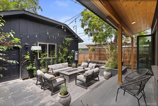 2533 N Emerson St, Denver, CO 80205 - view of patio featuring an outdoor living space with a fire pit and a deck