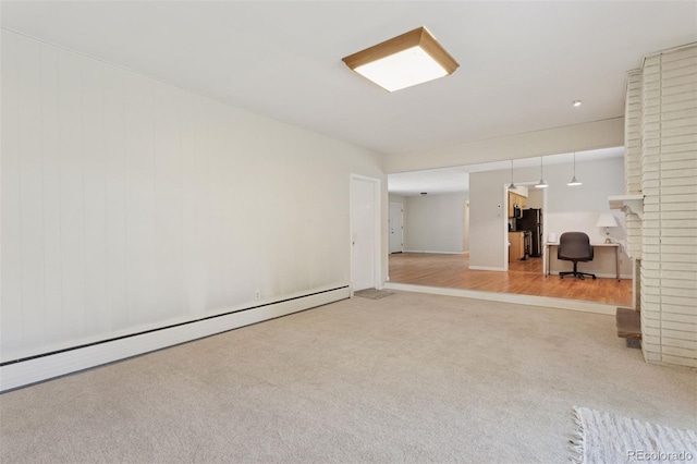 3030 S University Blvd, Denver, CO 80210 - unfurnished living room with light carpet, a baseboard heating unit, and a desk