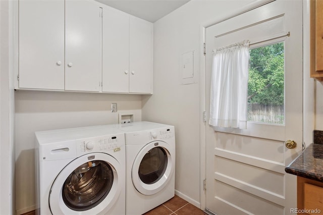 3030 S University Blvd, Denver, CO 80210 - washroom featuring washer and dryer, cabinet space, and tile patterned floors
