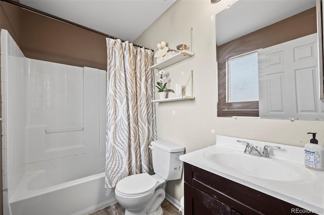 bathroom with shower / bath combination with curtain, toilet, and vanity