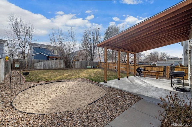 view of yard with a fenced backyard and a patio area