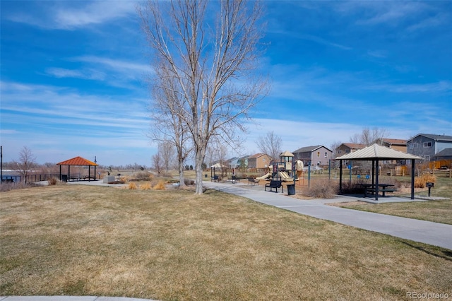 view of yard featuring a gazebo and playground community