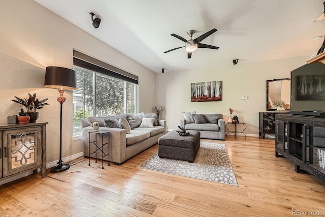 11839 E Fair Ave, Greenwood Village, CO 80111 - living area featuring ceiling fan and wood finished floors