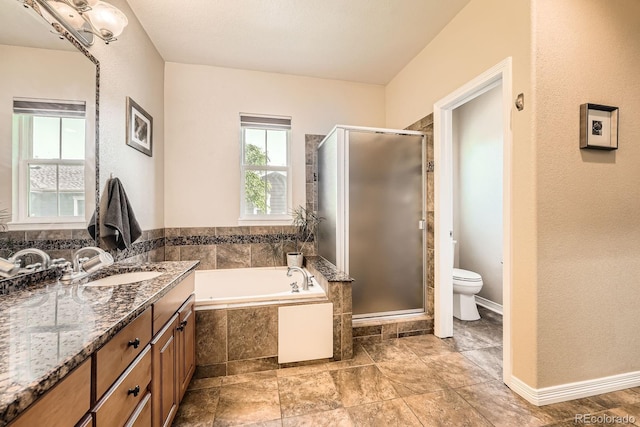 11839 E Fair Ave, Greenwood Village, CO 80111 - bathroom with vanity, a bath, and a stall shower