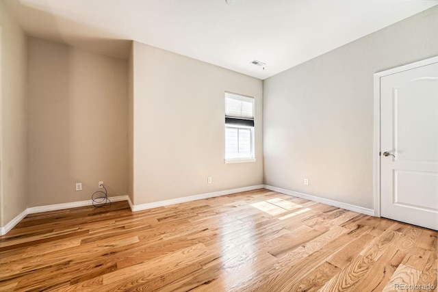 11839 E Fair Ave, Greenwood Village, CO 80111 - empty room featuring light wood-type flooring and baseboards