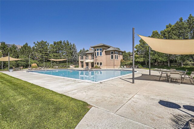 11839 E Fair Ave, Greenwood Village, CO 80111 - community pool featuring a patio and a yard