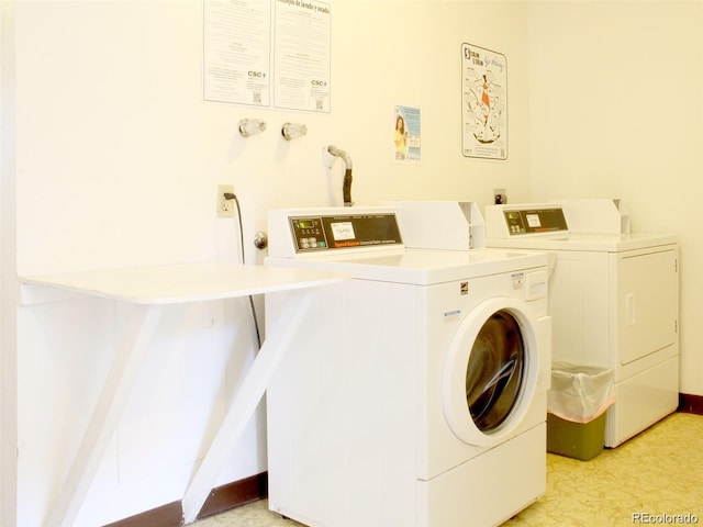 shared laundry area featuring washer and dryer
