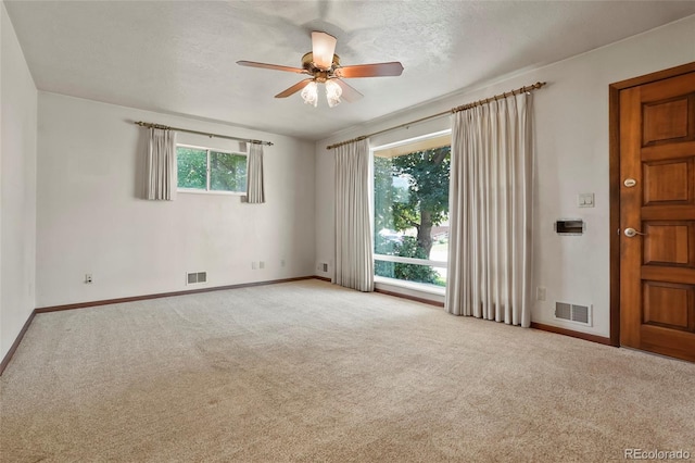 1803 Graves Ct, Northglenn, CO 80233 - empty room with ceiling fan, carpet floors, and a textured ceiling