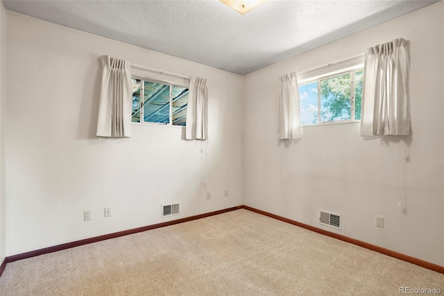 1803 Graves Ct, Northglenn, CO 80233 - carpeted spare room with baseboards and a textured ceiling