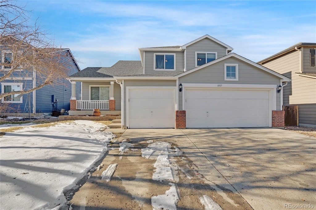 view of front of property with a garage