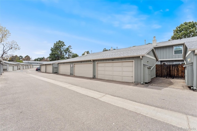 garage featuring fence