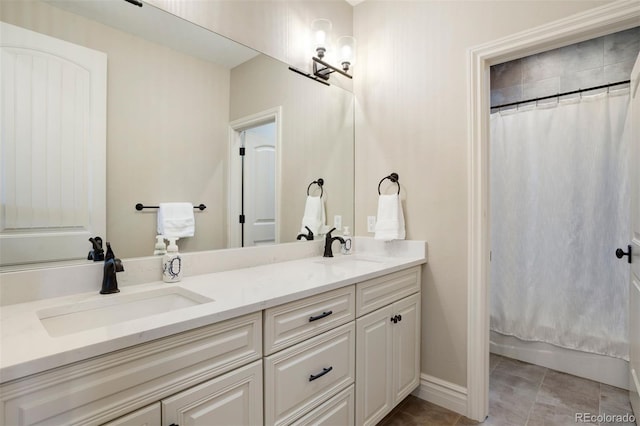 bathroom featuring vanity and tile patterned floors