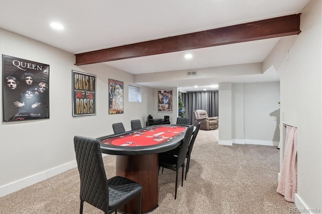 game room with beamed ceiling and carpet floors