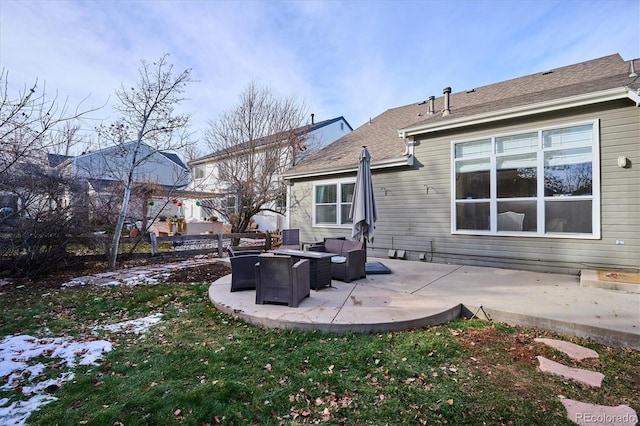 rear view of house featuring an outdoor hangout area and a patio