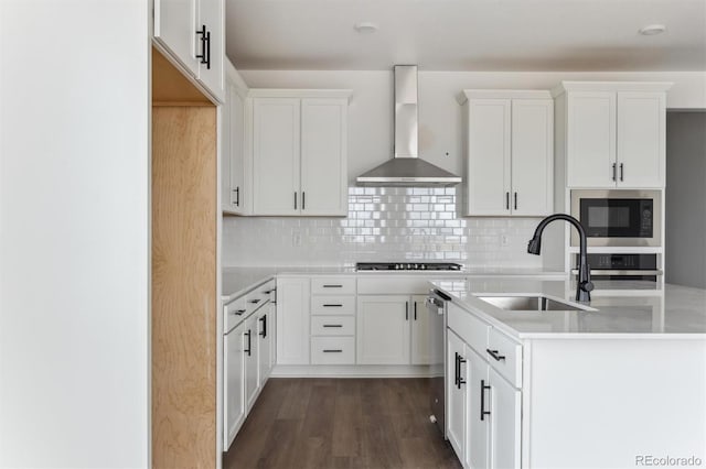 25283 E Warren Pl, Aurora, CO 80018 - kitchen with a sink, wall chimney exhaust hood, stainless steel appliances, and light countertops