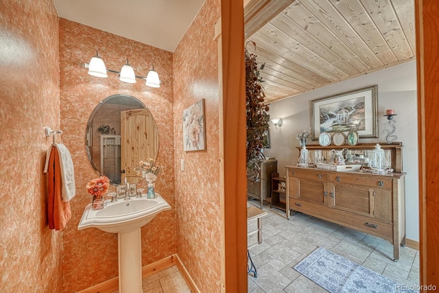 8126 Buck Run, Salida, CO 81201 - bathroom with baseboards and wooden ceiling