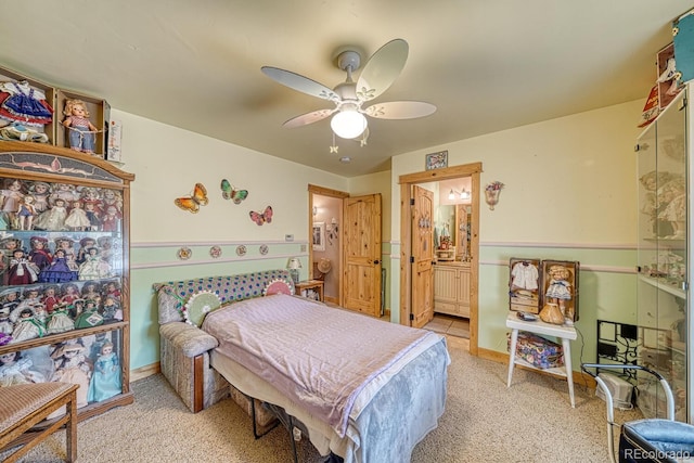 8126 Buck Run, Salida, CO 81201 - bedroom featuring light colored carpet, a ceiling fan, and ensuite bath