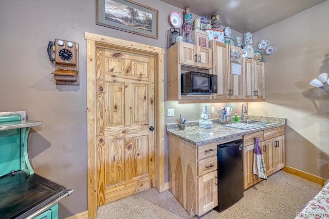 8126 Buck Run, Salida, CO 81201 - kitchen with black appliances, light carpet, baseboards, and light brown cabinetry
