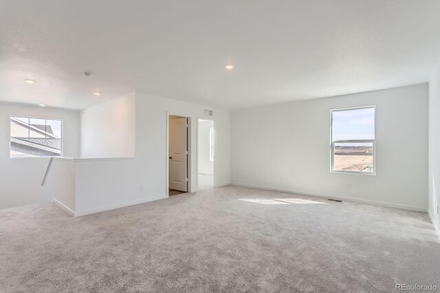 3909 N Shawnee St, Aurora, CO 80019 - carpeted empty room featuring recessed lighting and baseboards