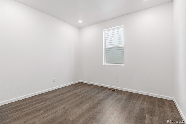 9359 Russell Cir, Arvada, CO 80007 - empty room featuring dark wood-type flooring, baseboards, and recessed lighting