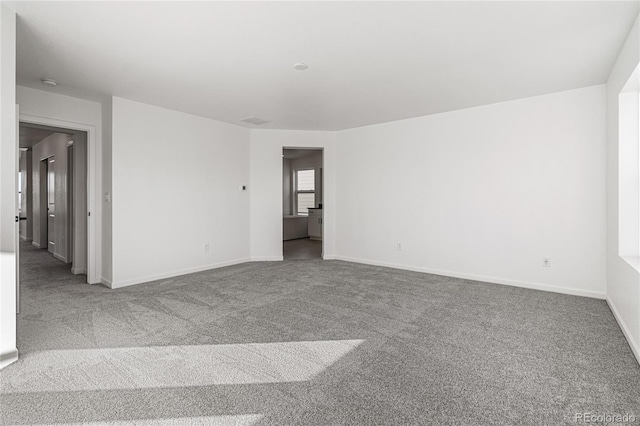 9359 Russell Cir, Arvada, CO 80007 - unfurnished room featuring carpet floors and baseboards