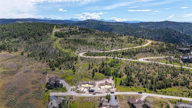 drone / aerial view featuring a mountain view