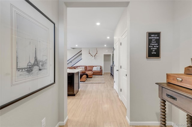 corridor featuring light hardwood / wood-style floors