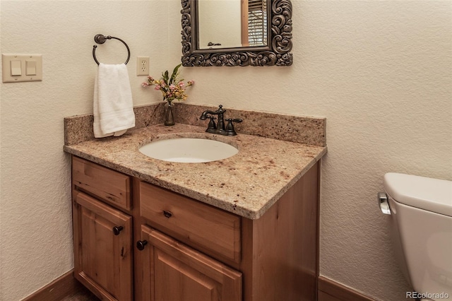 1715 Wales Dr, Berthoud, CO 80513 - bathroom with vanity and a textured wall
