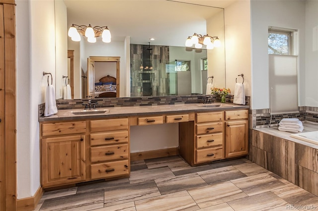 1715 Wales Dr, Berthoud, CO 80513 - ensuite bathroom featuring decorative backsplash, double vanity, tiled tub, and a shower