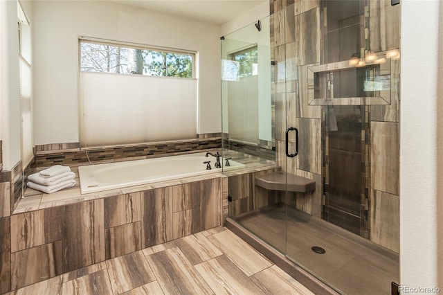 1715 Wales Dr, Berthoud, CO 80513 - bathroom featuring a bath and a stall shower