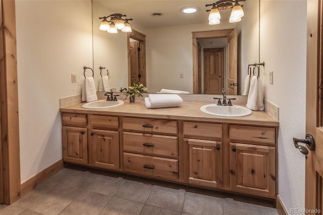 1715 Wales Dr, Berthoud, CO 80513 - bathroom with double vanity and tile patterned floors