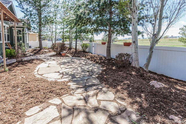 1715 Wales Dr, Berthoud, CO 80513 - fenced backyard featuring a patio area