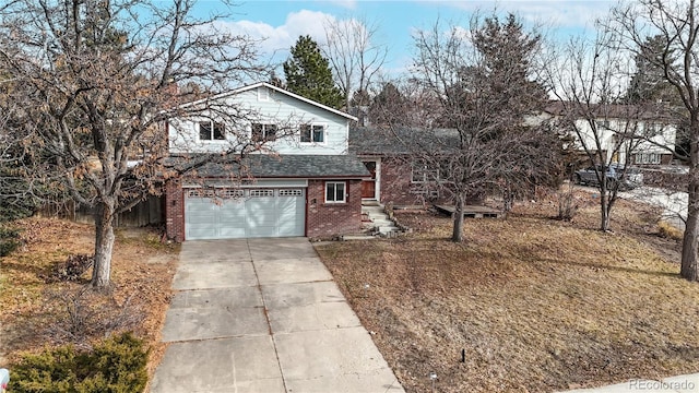 view of front of property with a garage