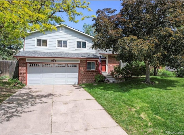 view of front facade featuring a front lawn and a garage