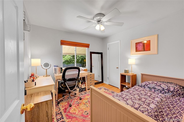3313 S Dexter St, Denver, CO 80222 - bedroom featuring light wood-type flooring, a desk, and ceiling fan