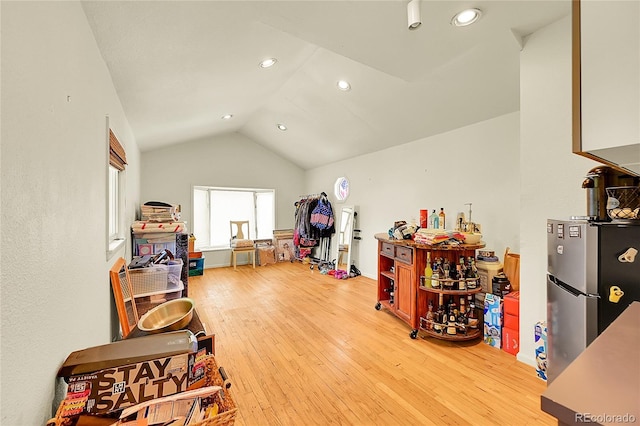 3313 S Dexter St, Denver, CO 80222 - misc room with lofted ceiling, light wood-style floors, and recessed lighting