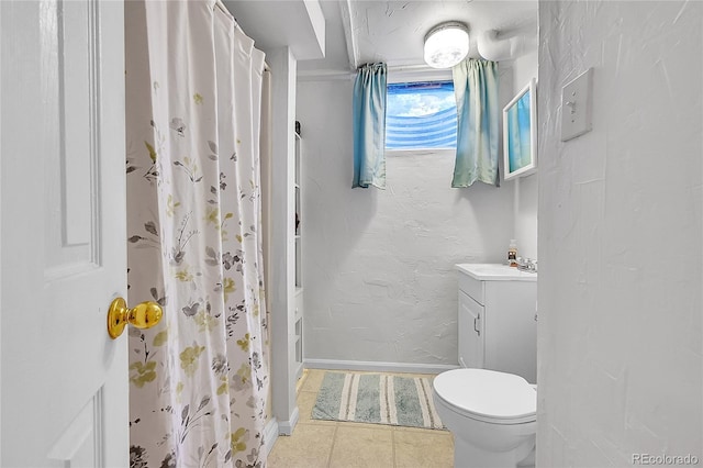 3313 S Dexter St, Denver, CO 80222 - bathroom featuring vanity, tile patterned flooring, a shower with curtain, and a textured wall