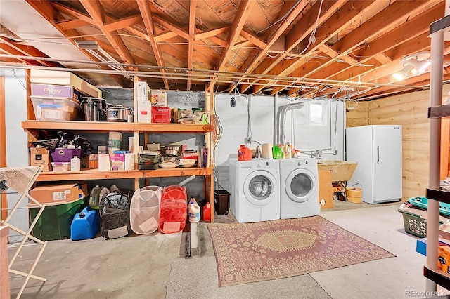 3313 S Dexter St, Denver, CO 80222 - basement with washing machine and clothes dryer and freestanding refrigerator