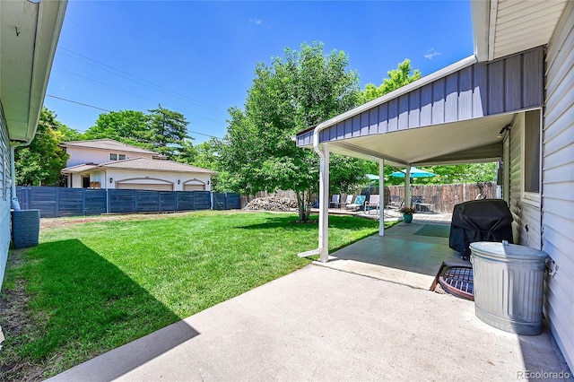 3313 S Dexter St, Denver, CO 80222 - fenced backyard featuring a patio area
