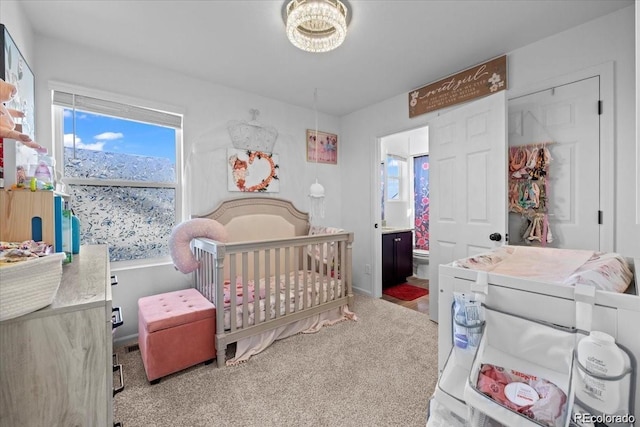 10909 Memphis Ct, Commerce City, CO 80022 - carpeted bedroom with a crib and baseboards