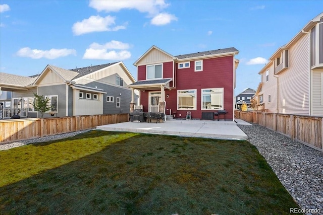 10909 Memphis Ct, Commerce City, CO 80022 - rear view of house with a patio area